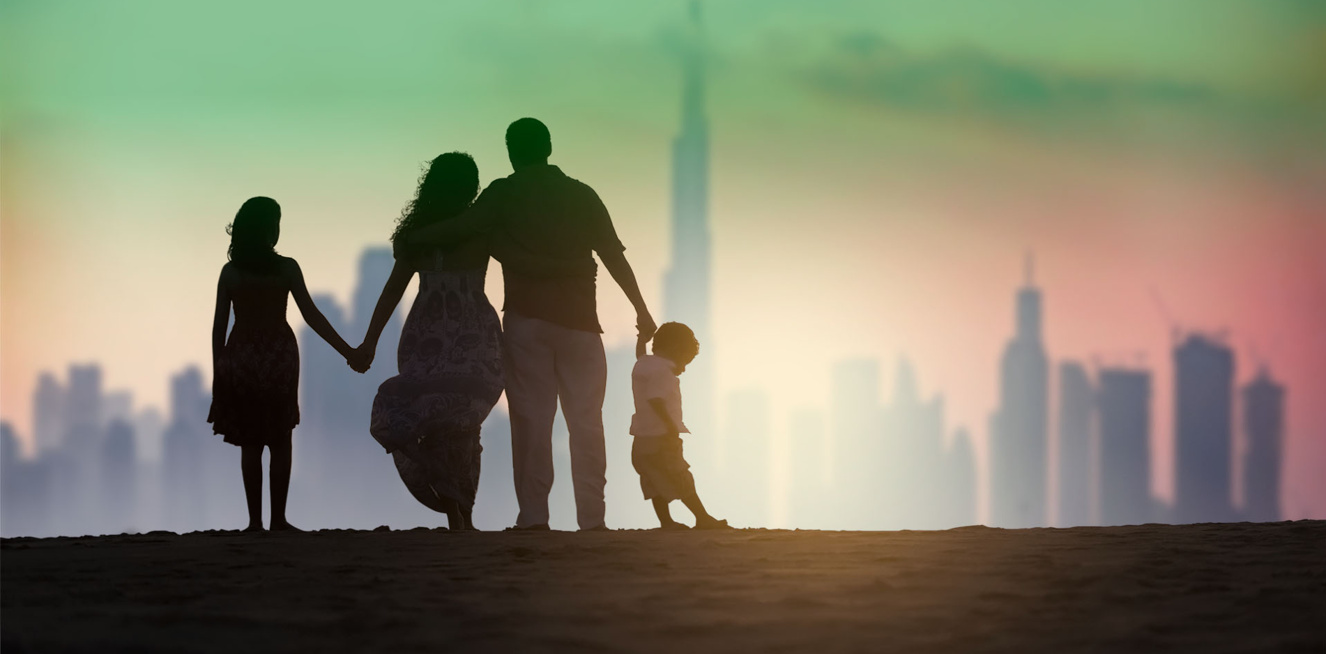 Family silhouette at sunset